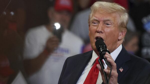 Former US President and 2024 Republican presidential candidate Donald Trump speaks during a campaign rally at the Georgia State University Convocation Center in Atlanta, Georgia, on August 3, 2024.  - Sputnik International