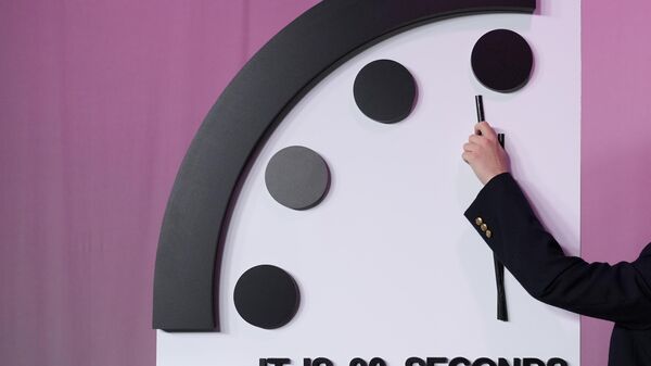 The Bulletin of the Atomic Scientists announces the latest decision on the Doomsday Clock minute hand, Tuesday, Jan. 23, 2024, at the National Press Club Broadcast Center, in Washington. This year, Jan. 2024, the clock will remain set to 90 seconds to midnight. (AP Photo/Jacquelyn Martin) - Sputnik International