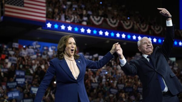 Democratic presidential nominee Vice President Kamala Harris and her running mate Minnesota Gov. Tim Walz speak at a campaign rally in Philadelphia, Tuesday, Aug. 6, 2024.  - Sputnik International