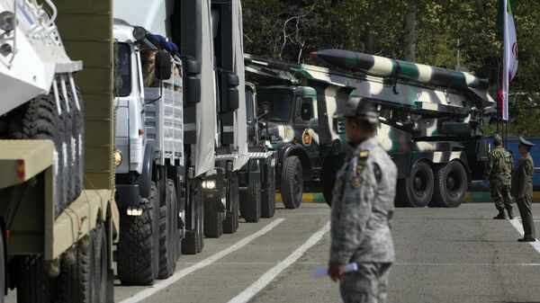 Missiles are carried on trucks during Army Day parade at a military base in northern Tehran, Iran, Wednesday, April 17, 2024. In the parade, President Ebrahim Raisi warned that the tiniest invasion by Israel would bring a massive and harsh response, as the region braces for potential Israeli retaliation after Iran's attack over the weekend. - Sputnik International