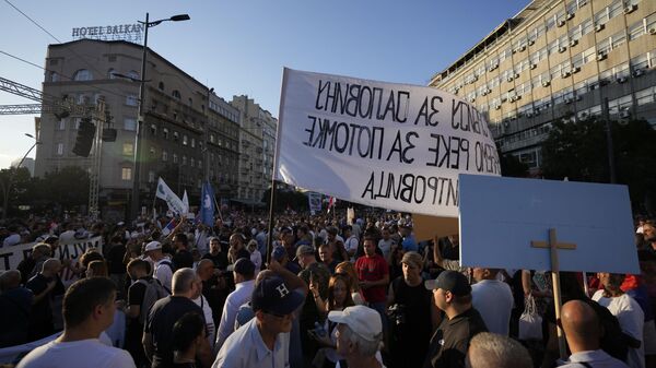 People attend a protest against pollution and the exploitation of a lithium mine in the country, in Belgrade, Serbia, Saturday, Aug. 10, 2024.  - Sputnik International