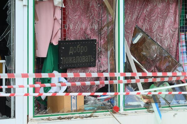 Shattered glass can be seen at a shop in the aftermath of Ukraine’s shelling of Kursk. - Sputnik International