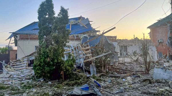 This photo released by the acting Governor of Kursk region Alexei Smirnov telegram channel on Tuesday, Aug. 6, 2024, shows a damaged house after shelling by the Ukrainian side in the city of Sudzha, Kursk region that borders Ukraine. - Sputnik International