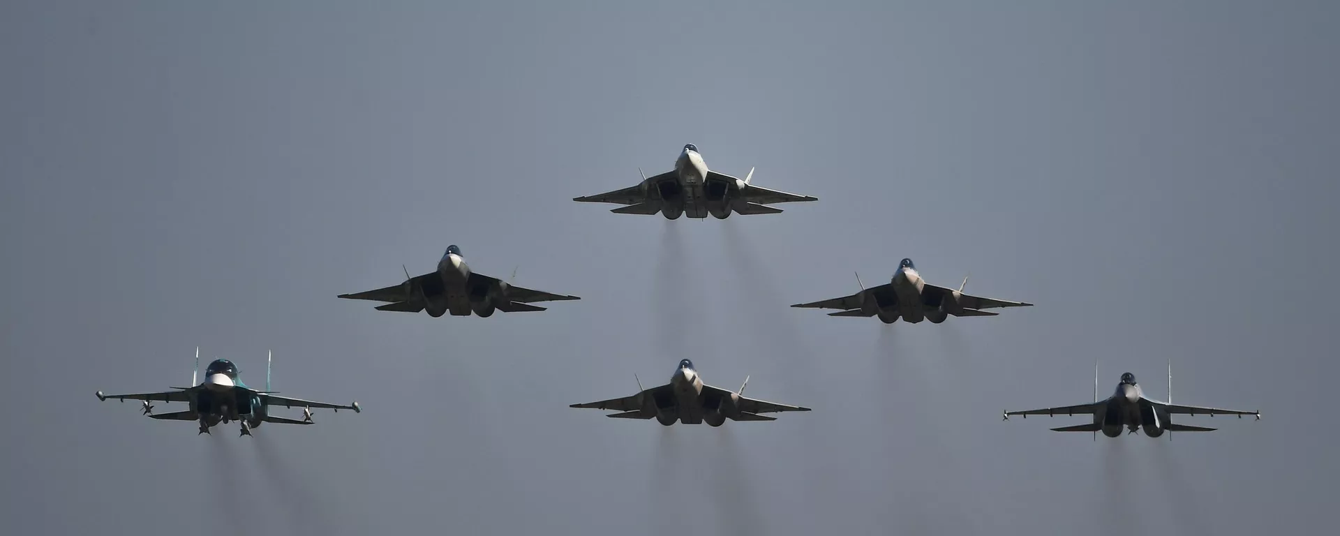 Russian Su-57, Su-34 and Su-35S fighter jets take part in an airshow. File photo. - Sputnik International, 1920, 26.12.2024