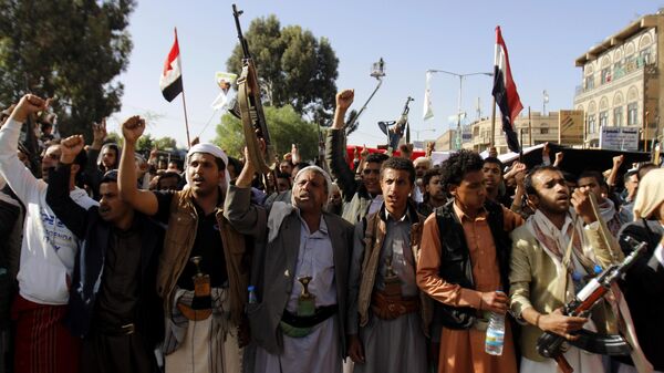 Supporters of the Shiite movement of Houthi protest in Sana'a against the UNSC's resolution on Yemen and against air strikes by the coalition headed by Saudi Arabia - Sputnik International