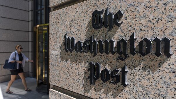 A person walks into the One Franklin Square Building, home of The Washington Post newspaper, Friday, June 21, 2024, in Washington. - Sputnik International