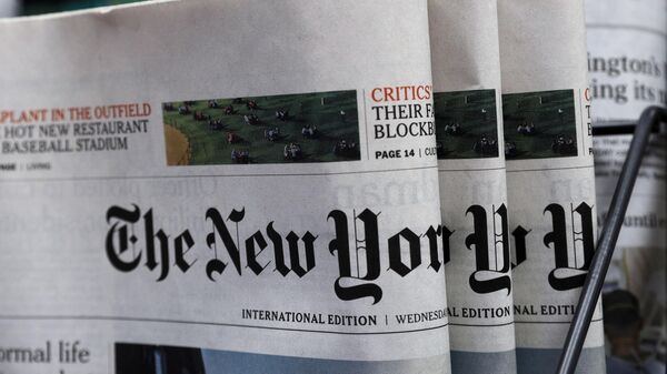  Copies of The New York Times newspaper displayed for sale at a news stand. - Sputnik International