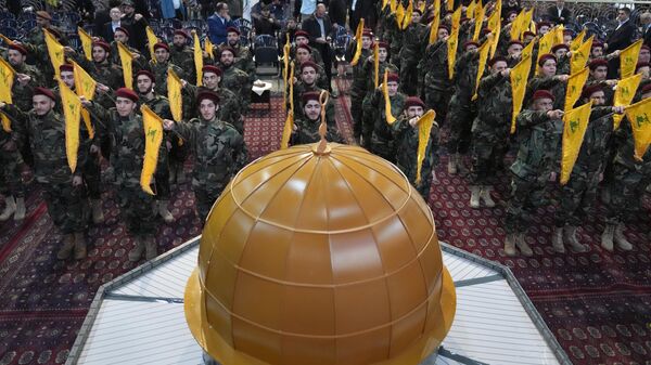 Hezbollah fighters parade in front of a replica of the Dome of the Rock Mosque during a rally to mark Jerusalem day, in a southern suburb of Beirut, Lebanon, Friday, April 14, 2023. File photo. - Sputnik International