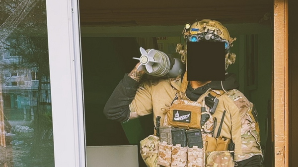 raoulduke_69 shares a picture on social media of a mercenary with a Forward Observation Group patch standing with an artillery shell, geotagged to Chasov Yar, August, 20, 2024, . Published under fair use. raoulduke_69 shares a picture on social media of a mercenary with a Forward Observation Group patch standing with an artillery shell, geotagged to Chasov Yar, August, 20, 2024, . Published under fair use. - Sputnik International