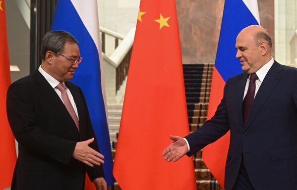 Russian PM Mikhail Mishustin and Chinese Premier Li Qiang. Mishustin stressed that the two governments have established a process for regular top-level meetings. - Sputnik International