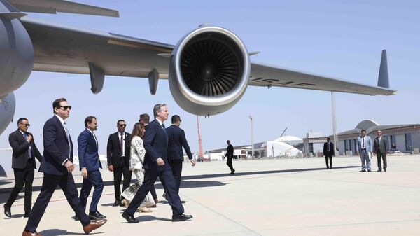 U.S. Secretary of State Antony Blinken walks after arriving at El-Alamein, Egypt, Tuesday, Aug.20, 2024.  - Sputnik International