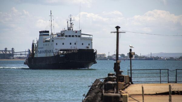 A ferry sails at the port of Kavkaz of the Kerch Strait ferry crossing in Krasnodar region, Russia - Sputnik International