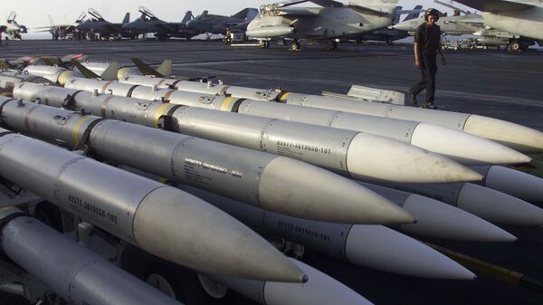 Ordnance sit on the flight deck of the USS Enterprise in the northern Indian Ocean, Sunday, Oct. 7, 2001 - Sputnik International