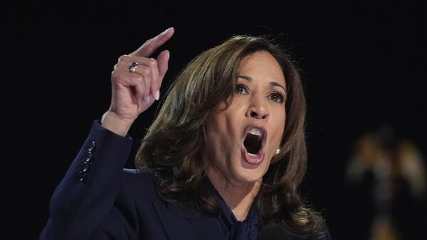 Democratic presidential nominee Vice President Kamala Harris speaks during the Democratic National Convention Thursday, Aug. 22, 2024, in Chicago - Sputnik International