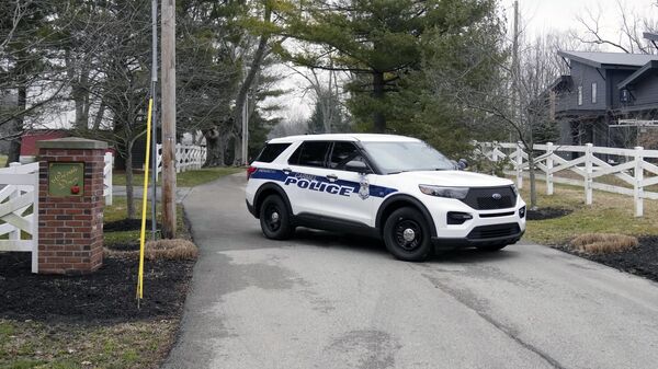 Police secure the entrance to the neighborhood of former Vice President Mike Pence's Indiana home, Friday, Feb. 10, 2023 in Carmel, Ind. The FBI is searching former Vice President Mike Pence’s Indiana home as part of a classified records probe - Sputnik International