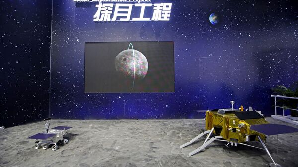 In this file photo taken Wednesday, Nov. 7, 2018, models of Chinese Chang'e IV Relay Satellite, right, and Lunar Probe Consists are displayed during the 12th China International Aviation and Aerospace Exhibition, also known as Airshow China 2018, in Zhuhai city, south China's Guangdong province - Sputnik International