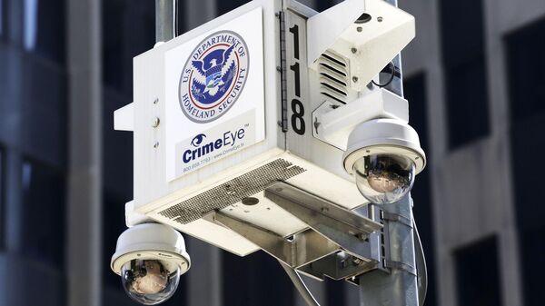 Security cameras operated by the Department of Homeland Security are installed in front of the Jacob K. Javits Federal Office Building at 26 Federal Plaza, June 3, 2014 in New York - Sputnik International