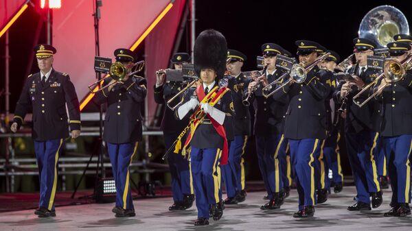 Members of the US Army Europe and Africa band and chorus perform during the Military Tattoo Lithuania 2024 international NATO military band festival - Sputnik International