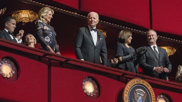 President Joe Biden and first lady Jill Biden react as they arrive at the 45th Kennedy Center Honors at the John F. Kennedy Center for the Performing Arts in Washington, Sunday, Dec. 4, 2022. Vice President Kamala Harris, second from right, second gentleman Doug Emhoff, Hunter Biden, left, and his wife Melissa Cohen look on. - Sputnik International