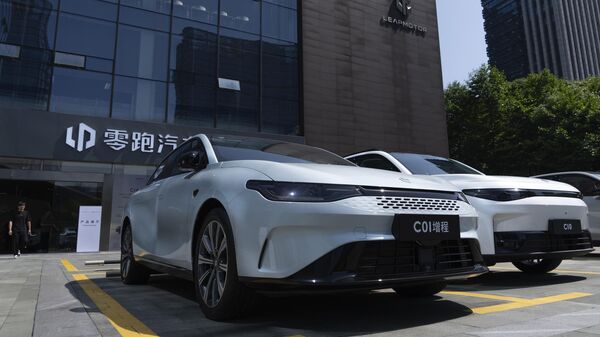 Leapmotor vehicles are parked outside a showroom in Hangzhou in eastern China's Zhejiang province on Tuesday, May 14, 2024 - Sputnik International