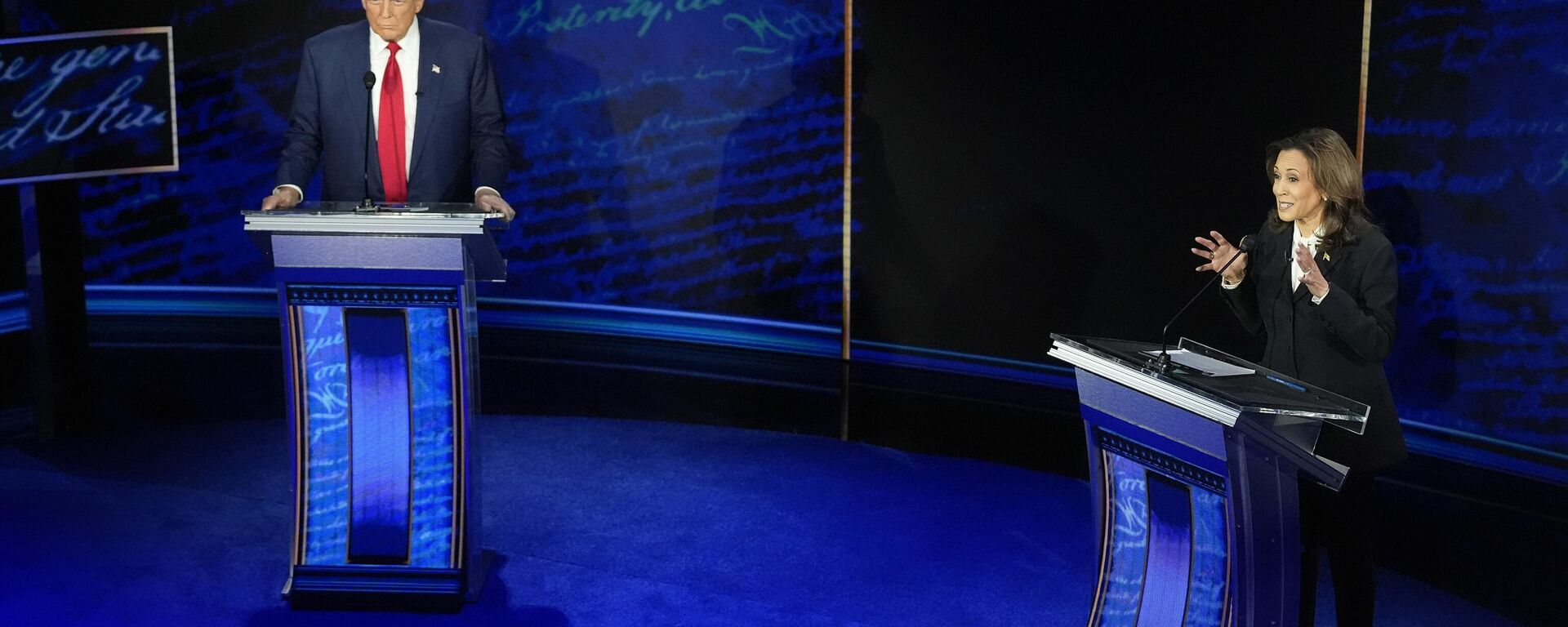 Republican presidential nominee former President Donald Trump watches as Democratic presidential nominee Vice President Kamala Harris speaks during an ABC News presidential debate at the National Constitution Center, Tuesday, Sept. 10, 2024, in Philadelphia.  - Sputnik International, 1920, 11.09.2024