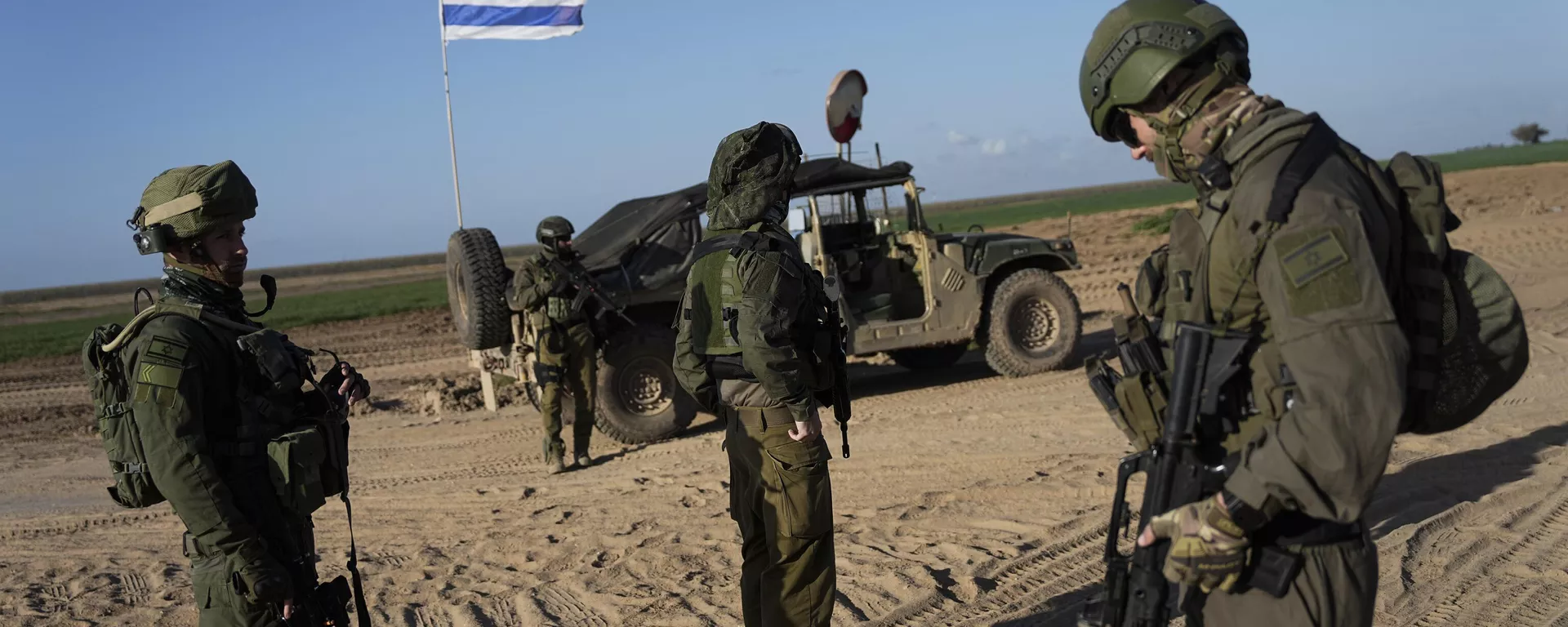 Israeli soldiers are seen near the Gaza Strip border in southern Israel, Monday, March 4, 2024 - Sputnik International, 1920, 09.12.2024