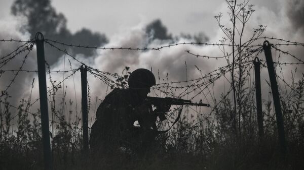 A serviceman from the special forces units of the National Guard of the Russian Federation - Sputnik International