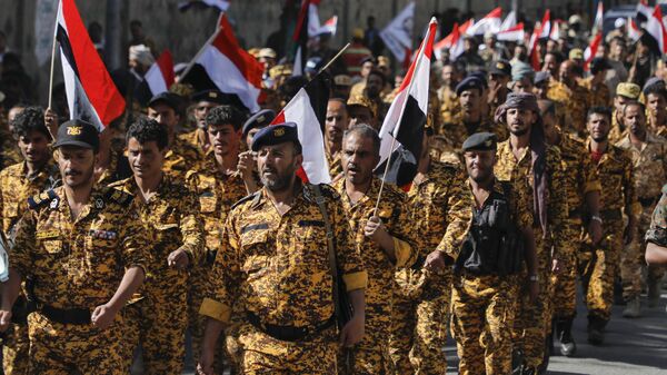 Houthi supporters march marking the anniversary of Yemeni unity in Sanaa, Yemen, Wednesday, May 22, 2024.  - Sputnik International