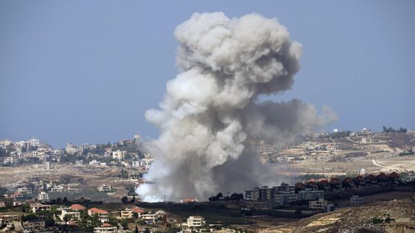 Smoke rises from Israeli shelling on villages in the Nabatiyeh district, seen from the southern town of Marjayoun, Lebanon, Monday, Sept. 23, 2024 - Sputnik International