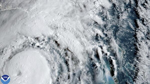 This satellite image provided by NOAA shows Hurricane Helene advancing across the Gulf of Mexico toward Florida on Thursday, Sept. 26, 2024.  - Sputnik International