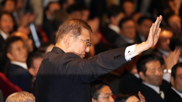 Shigeru Ishiba acknowledges after he was elected as new head of Japan's ruling party at the Liberal Democratic Party's (LDP) leadership election Friday, Sept. 27, 2024, at the party headquarters in Tokyo - Sputnik International