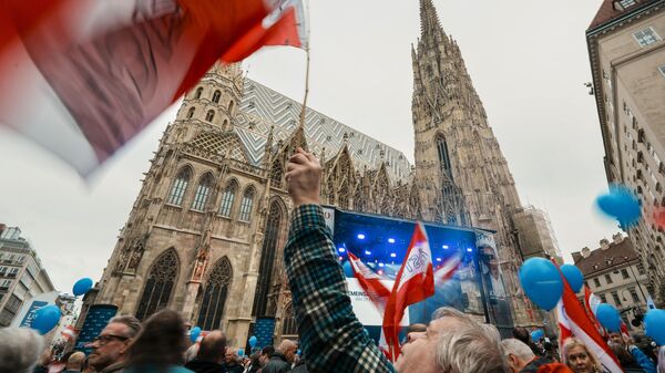 People attend the final electoral rally of Herbert Kickl, leader of the Freedom Party of Austria on Sept. 27, 2024, ahead of the country's national election. - Sputnik International