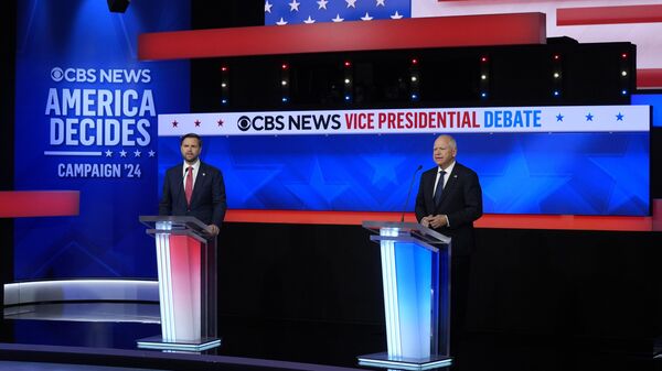 Republican vice presidential nominee Sen. JD Vance, R-Ohio, and Democratic vice presidential nominee Minnesota Gov. Tim Walz, participate in a vice presidential debate - Sputnik International