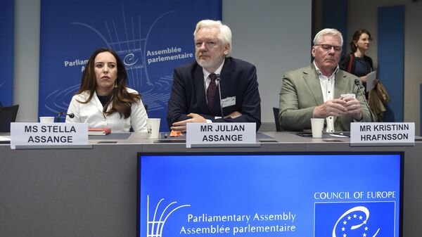 Wikileaks founder Julian Assange, center, his wife Stella Assange, left, and editor-in-chief of WikiLeaks Kristin Hrafnsson, listen the open speech at the Council of Europe while his wife Stella Assange sits next to him, in Strasbourg, eastern France, Tuesday, Oct. 1, 2024 - Sputnik International