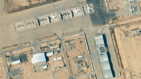 An image of Nevatim Airbase taken on Oct. 2 shows damage to a hangar and a taxiway caused by Iranian missile strikes.  - Sputnik International