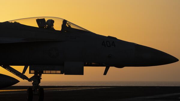 A fighter jet maneuvers on the deck of the USS Dwight D. Eisenhower in the Red Sea on Tuesday, June 11, 2024. - Sputnik International