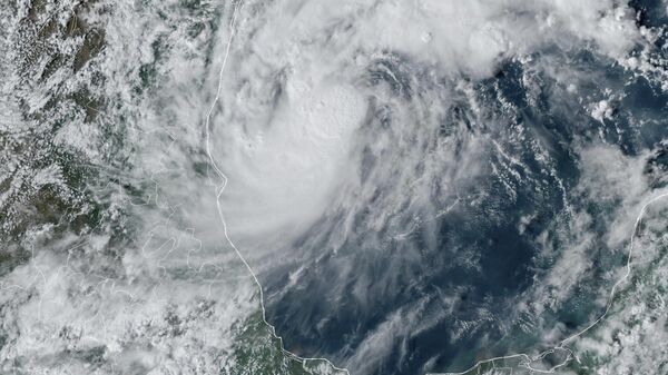 his GOES-16 GeoColor satellite image taken at 4:50 p.m. EDT and provided by National Oceanic and Atmospheric Administration (NOAA) shows Tropical Storm Milton, center, off the coast of Mexico in the Gulf of Mexico. - Sputnik International