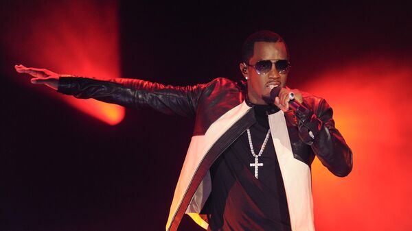 Hip-hop entrepreneur Sean P. Diddy Combs performs at Caesars Entertainment Escape to Total Rewards kick-off at Gotham Hall on Thursday, March 1, 2012 in New York.  - Sputnik International