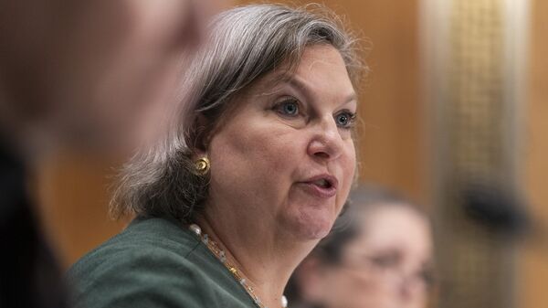 Under Secretary of State for Political Affairs Victoria Nuland, center, testifies before a Senate Foreign Relations Committee hearing  - Sputnik International