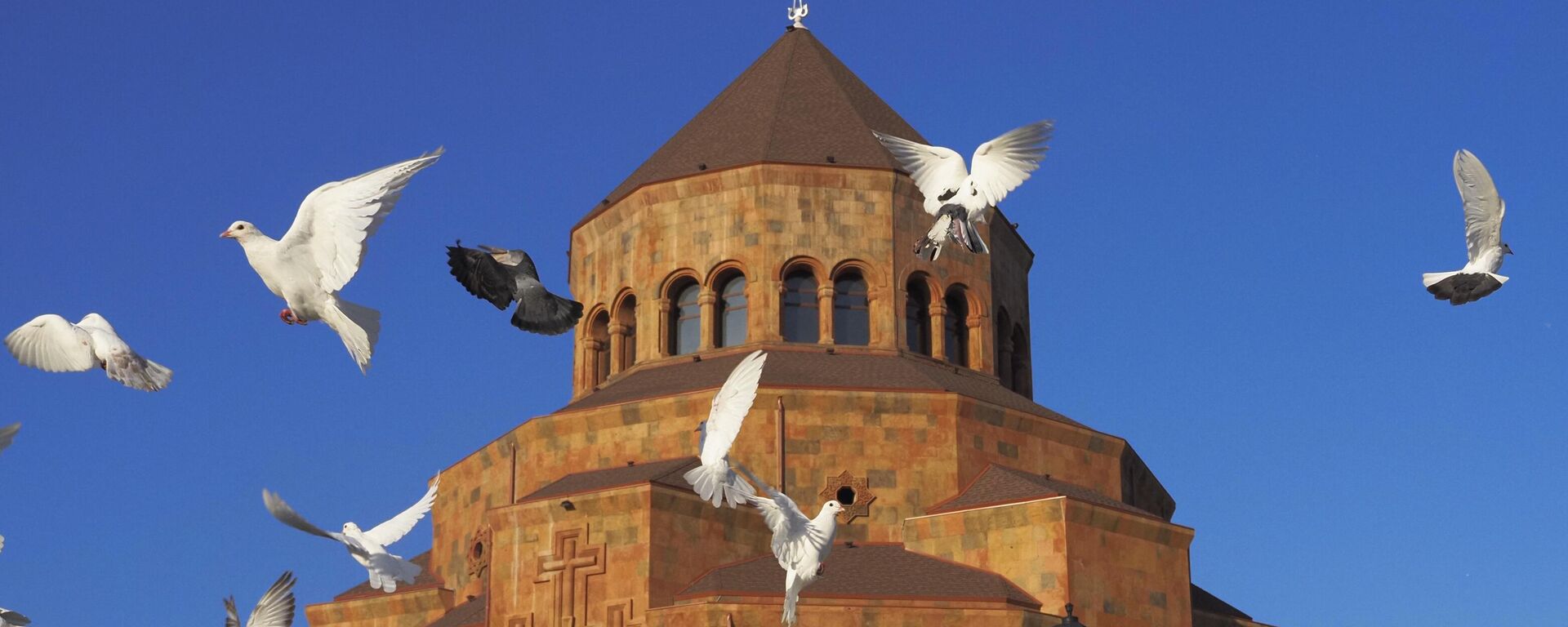 Pigeons fly near Holy Mother of God Cathedral in Stepanakert, in the separatist region of Nagorno-Karabakh, Friday, Oct. 30, 2020 - Sputnik International, 1920, 10.07.2025