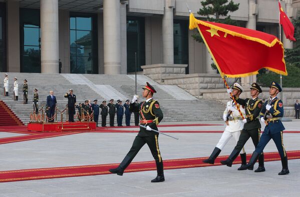 Andrei Belousov and Chinese Defense Minister Admiral Dong Jun at a ceremony outside the Central Military Council of the People's Republic of China in Beijing. - Sputnik International