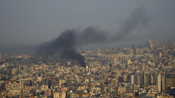 Smoke rise from Israeli airstrikes on Dahiyeh, Beirut's southern suburbs, Lebanon, Wednesday, Oct. 16, 2024. - Sputnik International