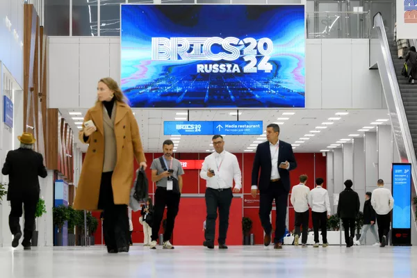 Visitors attend the 16th BRICS Summit in Kazan, Russia. - Sputnik International