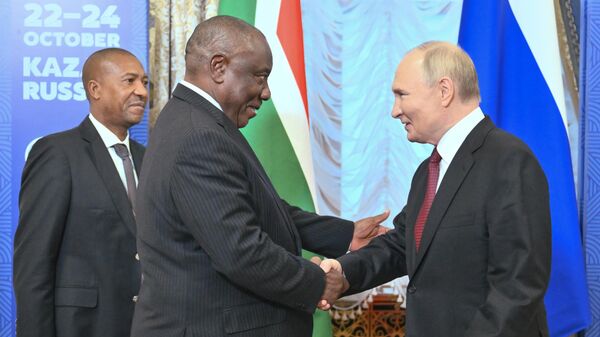 President of Russia Vladimir Putin and President of South Africa Cyril Ramaphosa during their meeting at the 16th BRICS Summit in Kazan. Tuesday, October 22, 2024. - Sputnik International