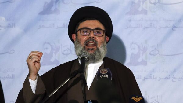 Senior Hezbollah leader Hashem Safieddine speaks during a news conference in the southern Beirut suburb of Dahiyeh, Lebanon, on Jan. 12, 2022 - Sputnik International