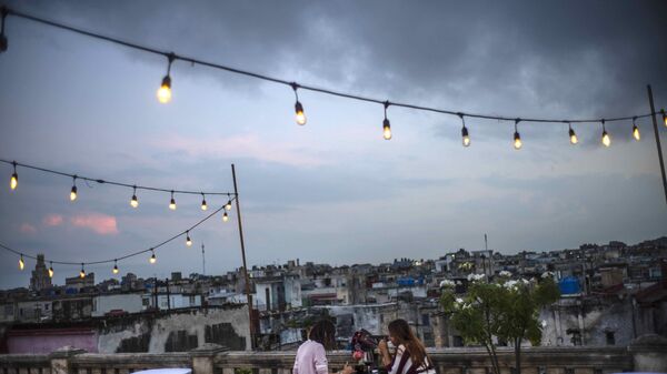 Customers sit on a terrace at La Guarida restaurant in Havana, Cuba, Wednesday, Nov. 3, 2021 - Sputnik International