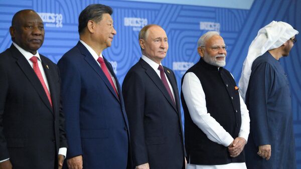 BRICS bloc leaders meeting for a photo session. From left to right: South African President Cyril Ramaphosa, Chinese President Xi Jinping, Russian President Vladimir Putin, Indian Prime Minister Narendra Modi and UAE President Mohamed bin Zayed Al Nahyan. - Sputnik International