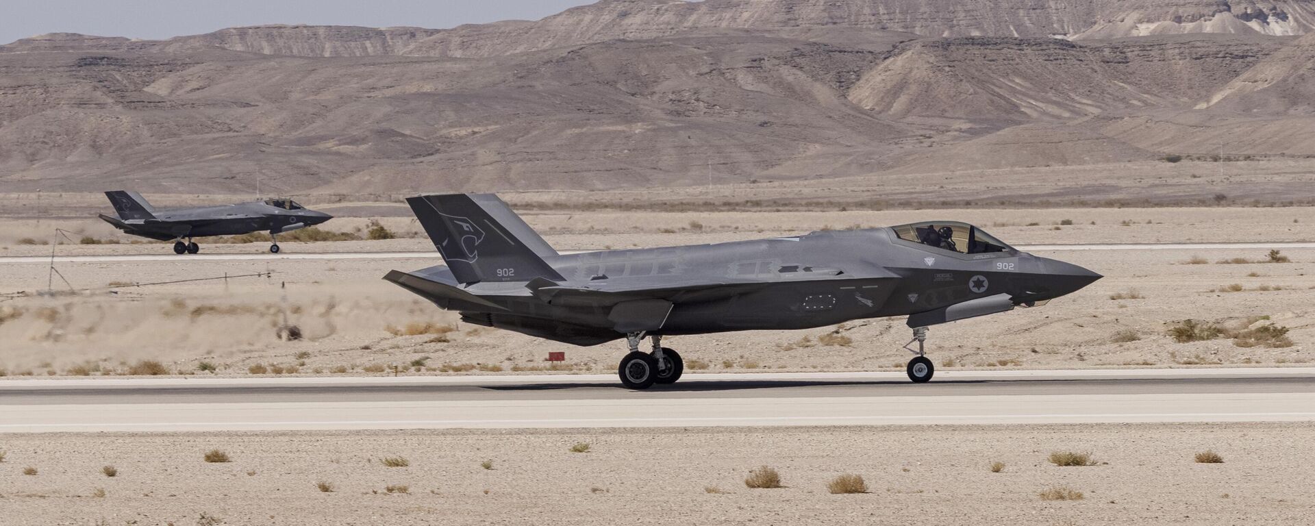 An Israeli F-35 lands at Ovda airbase during the bi-annual multi-national aerial exercise known as the Blue Flag, at Ovda airbase near Eilat, southern Israel, Sunday, Oct. 24, 2021. - Sputnik International, 1920, 18.06.2025