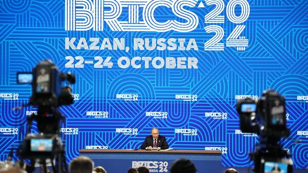 Russian President Vladimir Putin attends a press conference on the sidelines of the 16th BRICS Summit in Kazan, Republic of Tatarstan, Russia. - Sputnik International