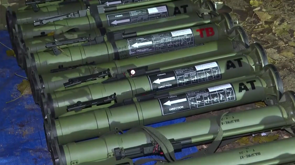 Anti-tank launchers among cache of weapons seized following merc attempt to infiltrate Russia's Bryansk region. Screenshot of video released by the FSB. - Sputnik International